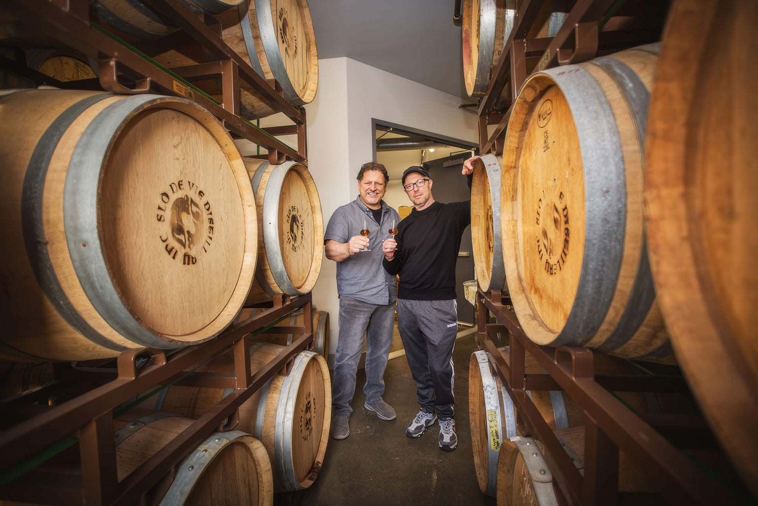 Unusual Duo Toasts to Success in Distilling Business