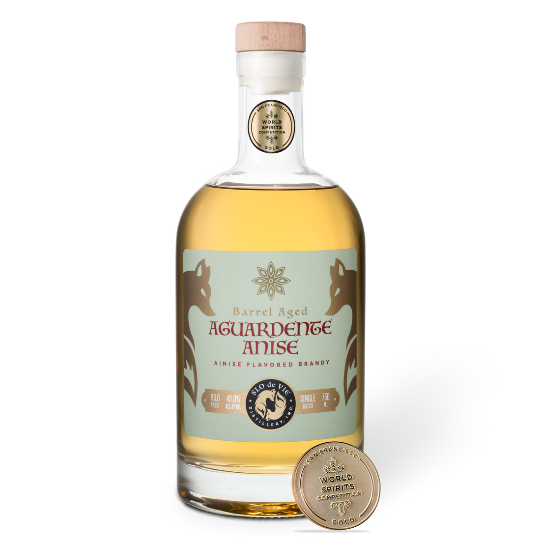 Bottle of Barrel Aged Aguardente Anise with a San Francisco World Spirits Competition gold medal on a white background