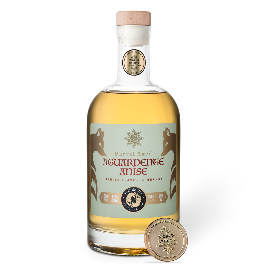 Bottle of Barrel Aged Aguardente Anise with a San Francisco World Spirits Competition gold medal on a white background
